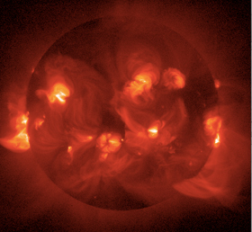 写真：X線で見た太陽（ようこう衛星で撮像。提供：JAXA）